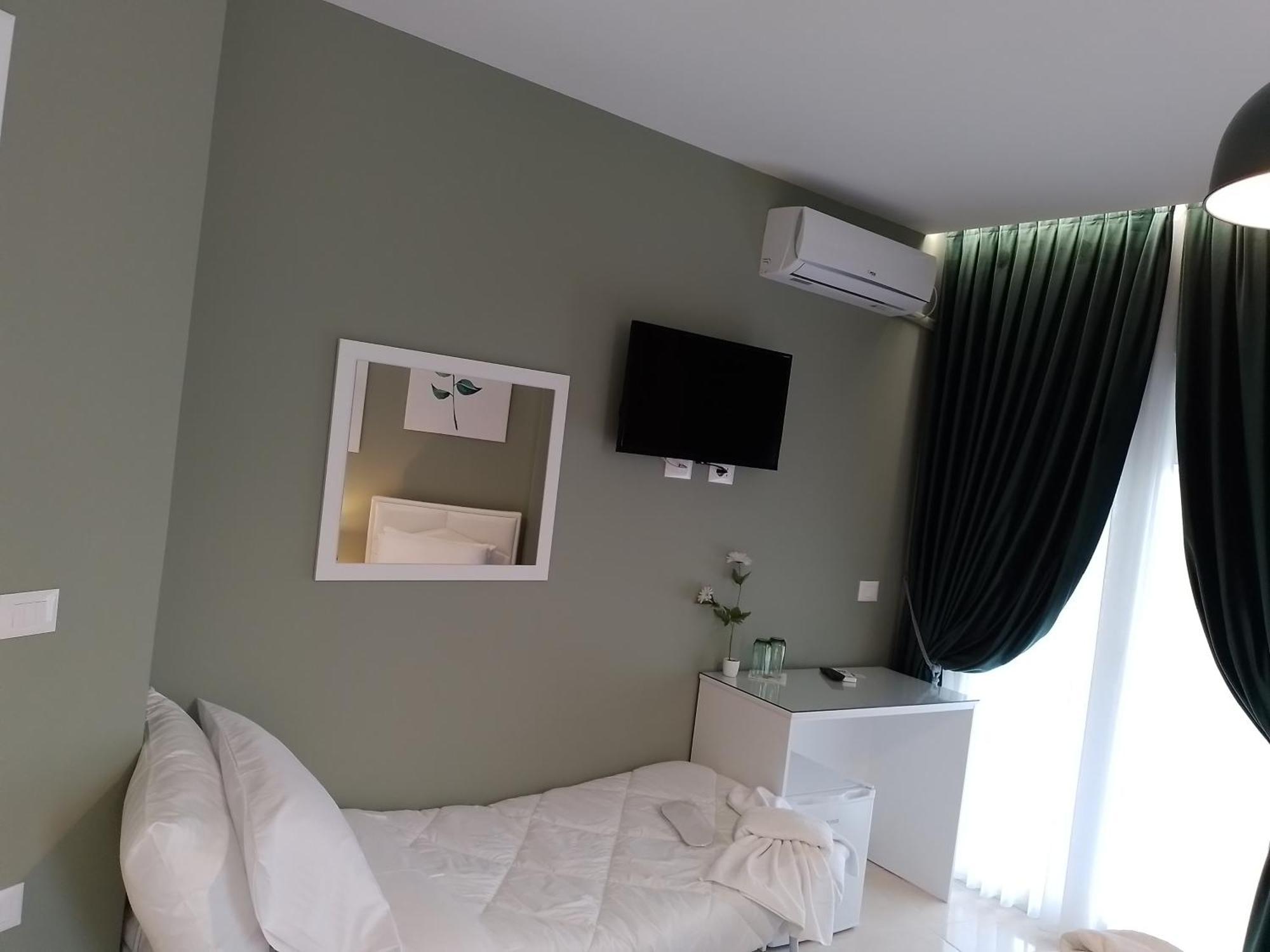 Ajilin Hotel Rooms คอร์เชอ ห้อง รูปภาพ